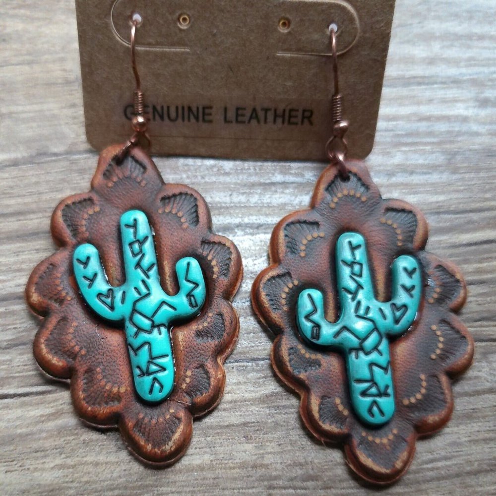 real leather earrings new  catus never worn as is